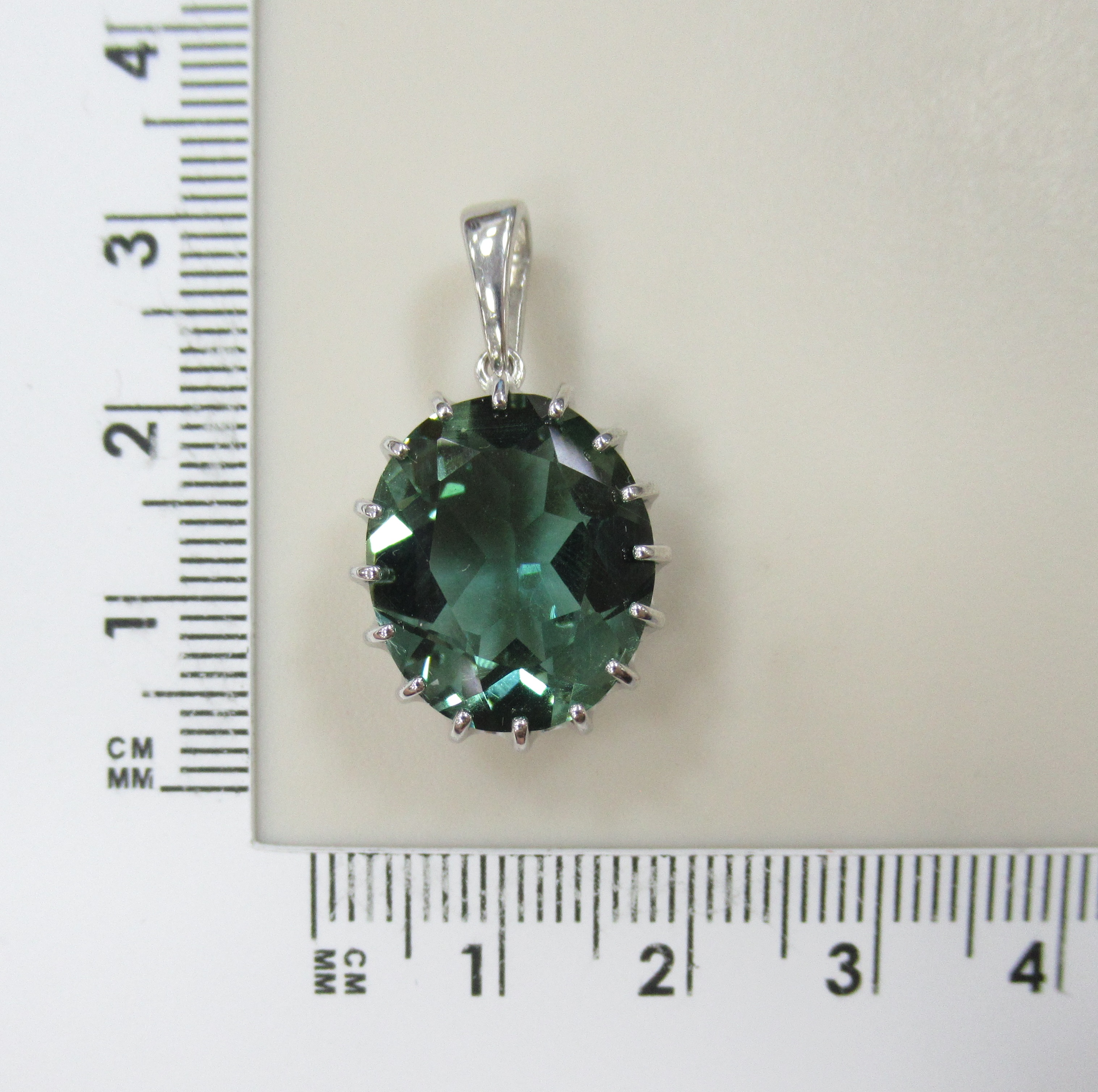 Серебряная подвеска с празиолитом